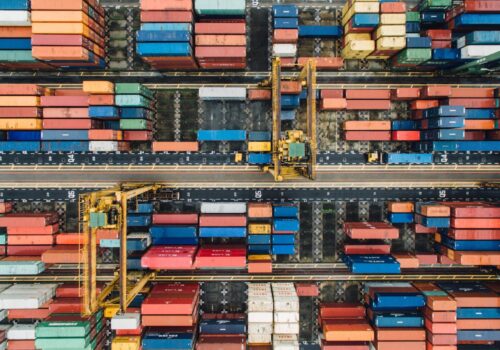 aerial view of stacked rows of freight containers