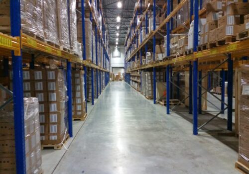 warehouse aisle view with palletized racking