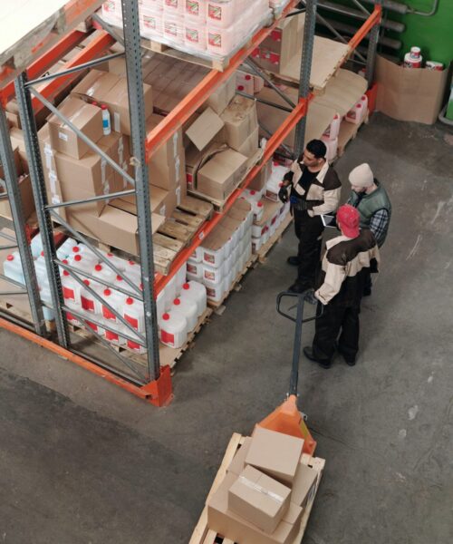 aerial view of warehouse with workers and products